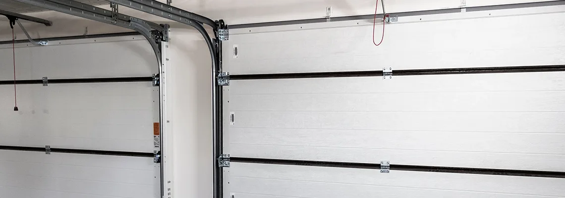 Fix Folding Garage Door Jerking in South Miami Heights, Florida
